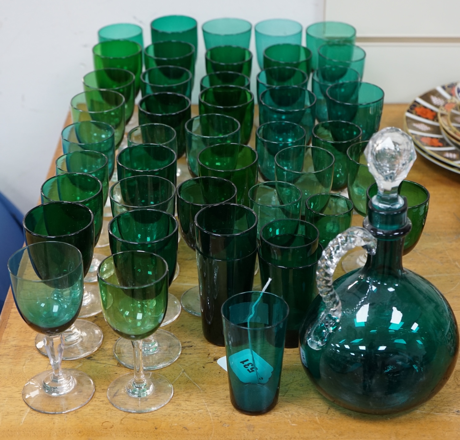 A collection of Victorian green glassware including a claret jug, 24cm. Condition - mostly good